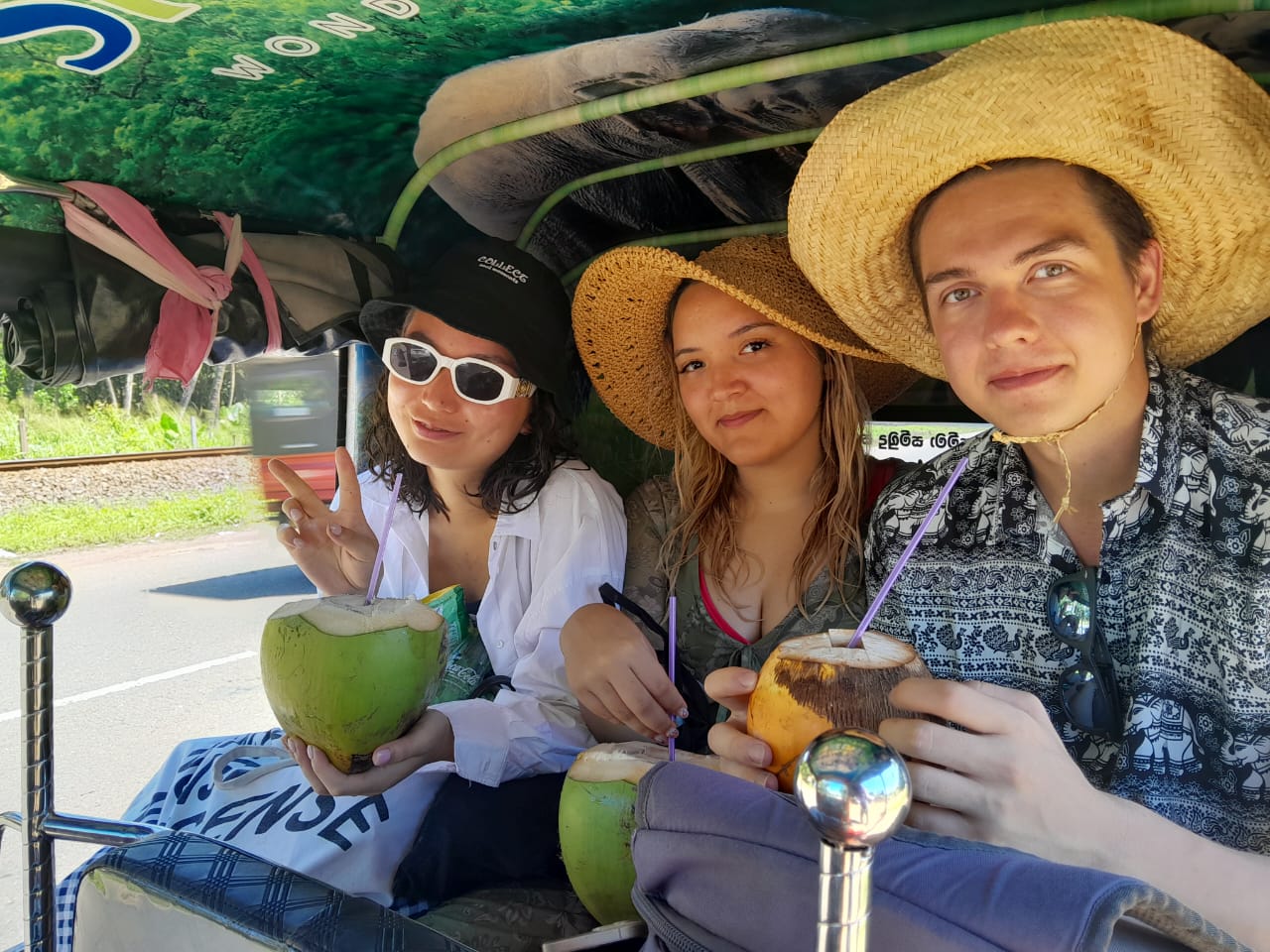 Guide with travellers tuk tuk